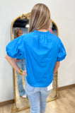 Spring Forward Ruffle Neck Top Blue