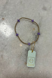 E Newton Signature Cross Small Gold Pattern 2mm Bead Bracelet Purple