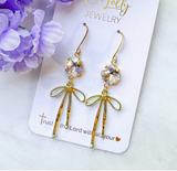 "Blakely"- Clear 10mm Stone W/Gold Bow Dangle Earrings